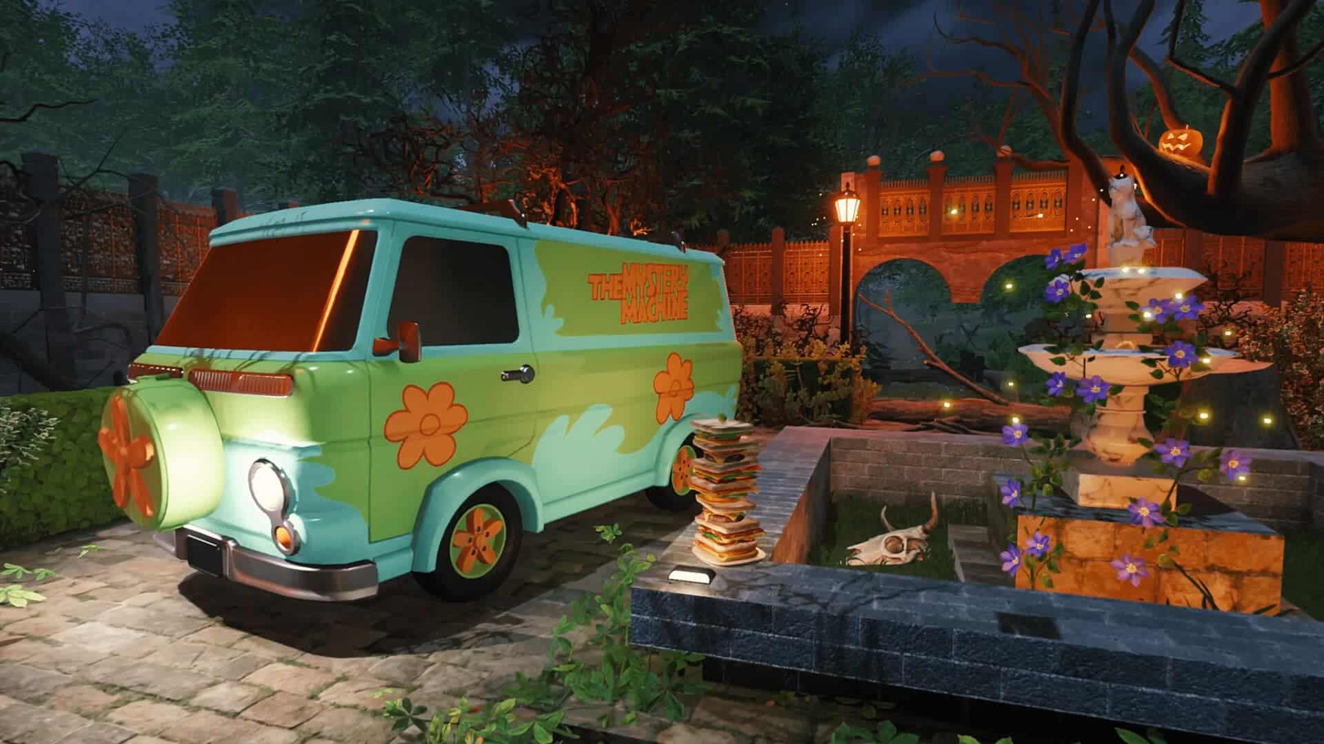 The mystery machine from scooby doo is parked next to a fountain in a garden of a large house. 
