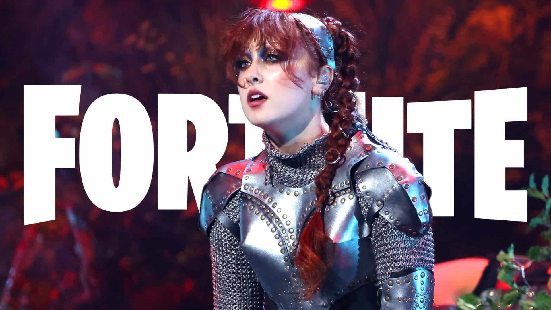 Chappell Roan in her VMAs medieval knight outfit in front of the Fortnite logo