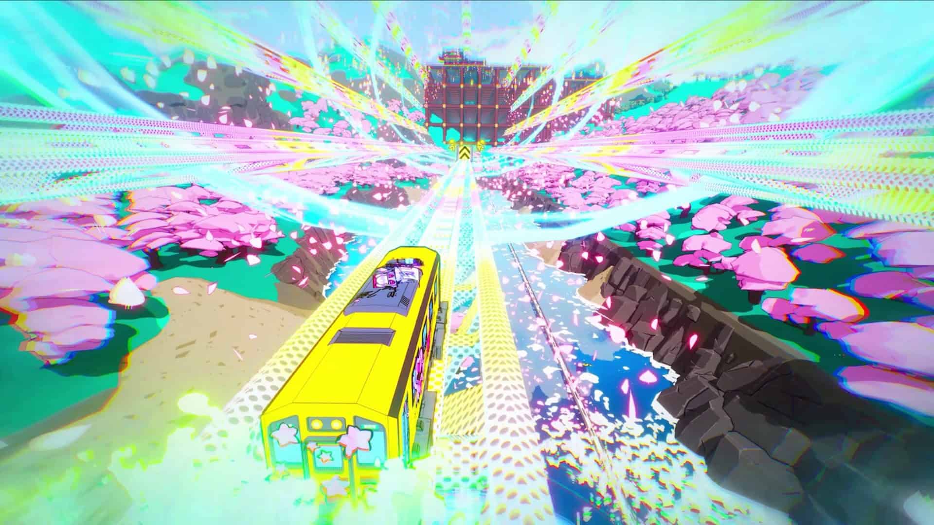 A train driving on a track above sakura blossoms