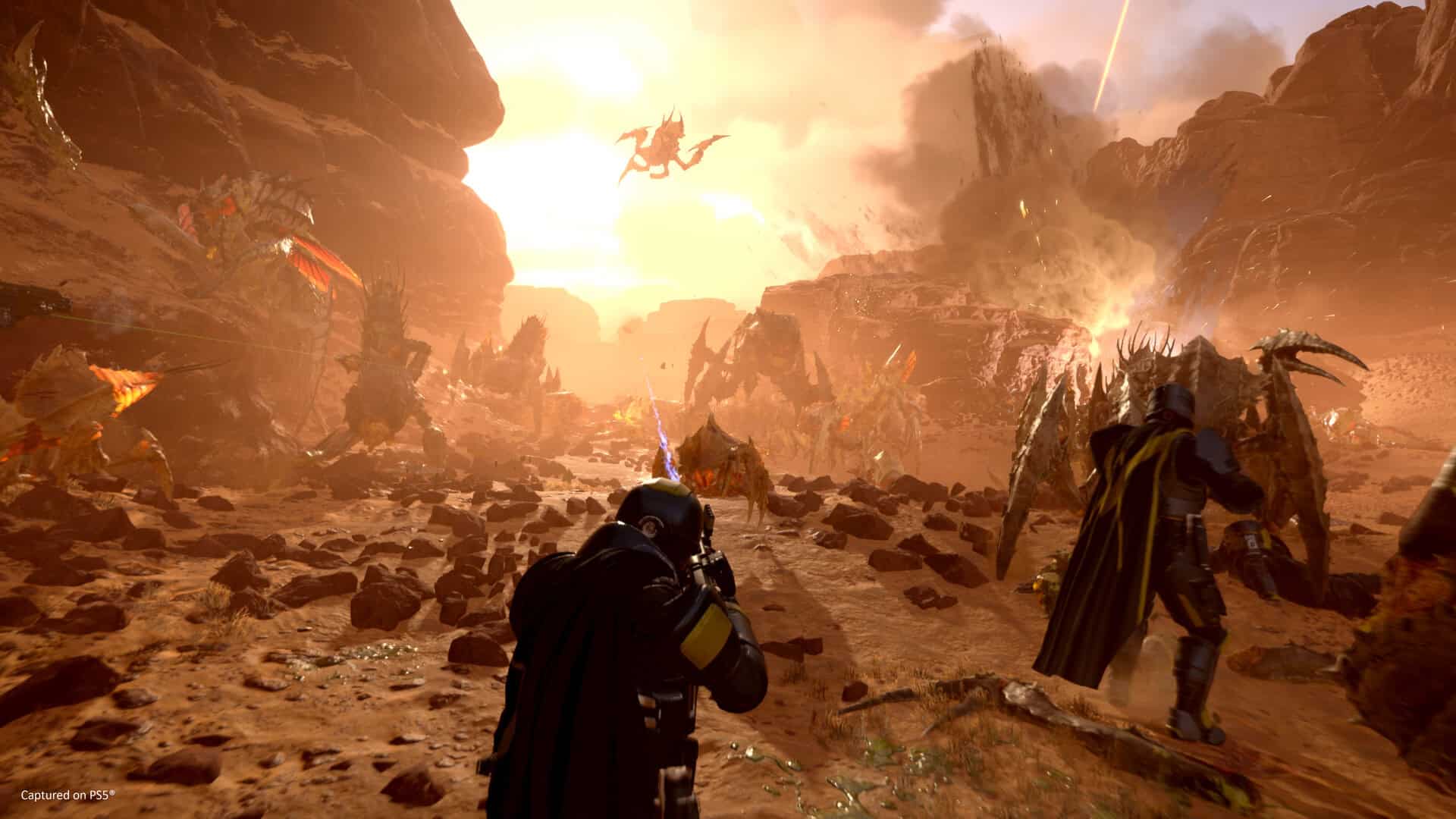 Helldivers 2 screenshot showing soldiers fighting alien bugs