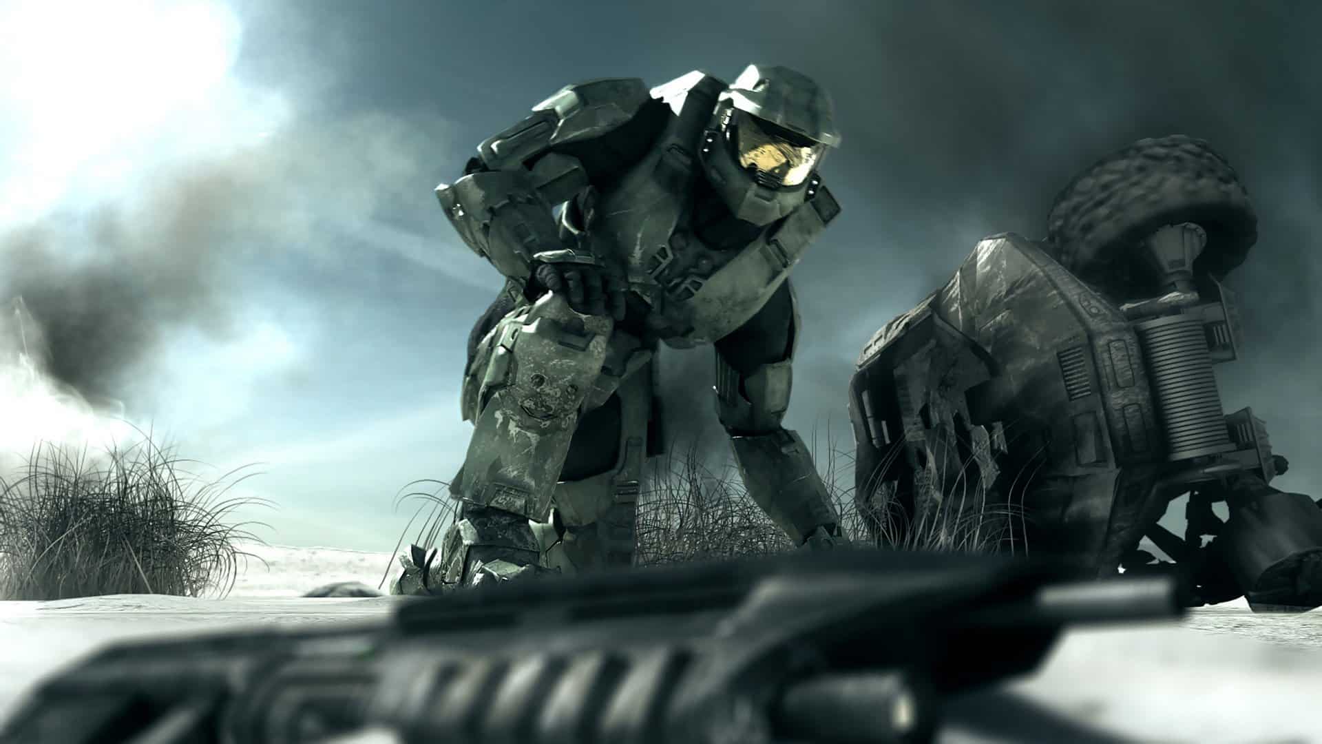 The Master Chief getting to his feet after his vehicle flips over, and looking over at his weapon.