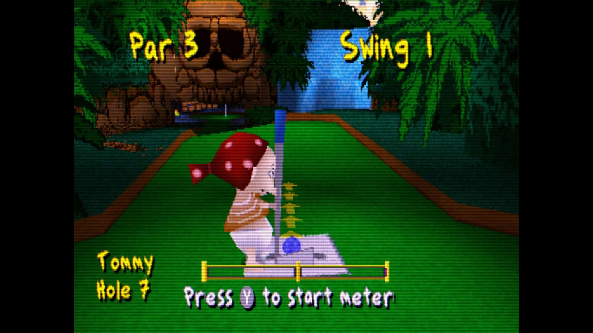Tommy Pickles in a pirate costume playing minigolf in Rugrats: Studio Tour