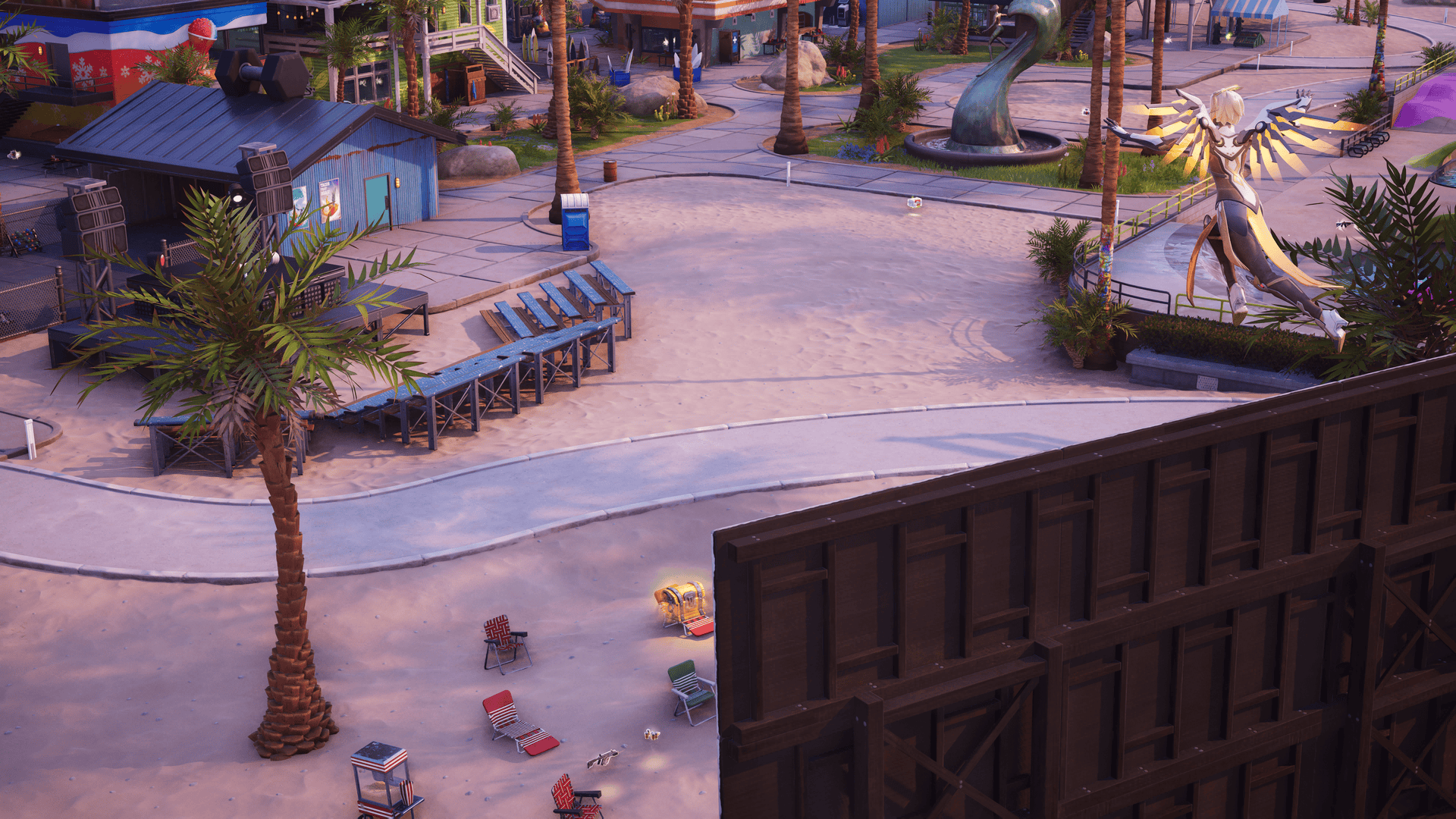 Fortnite Mercy from Overwatch jumping from a height down toward the beach