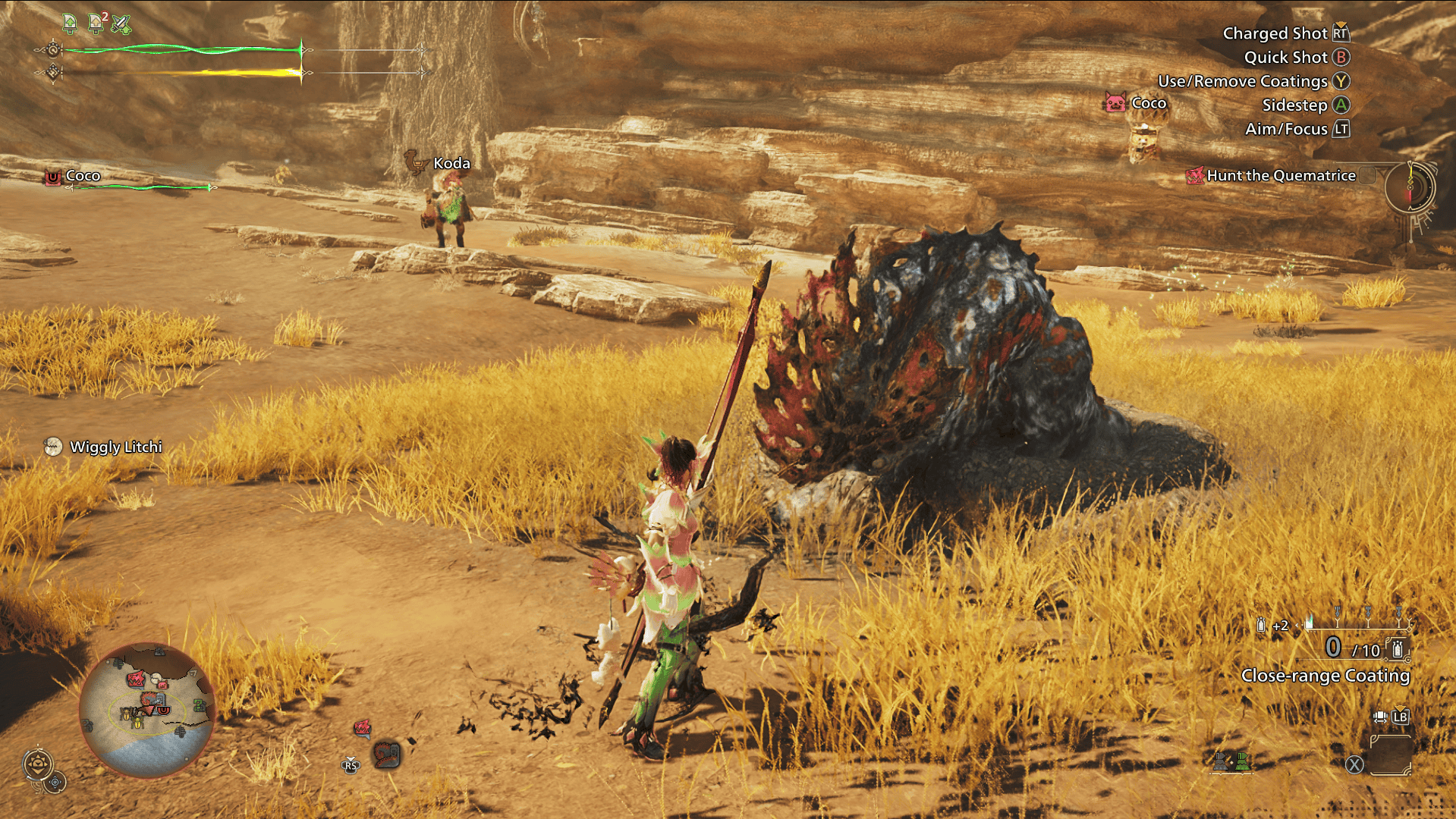 Screenshot from Monster Hunter Wilds of a Quematrice - a chicken-like monster - stuck in a pitfall trap, while a female hunter wielding a bow watches on