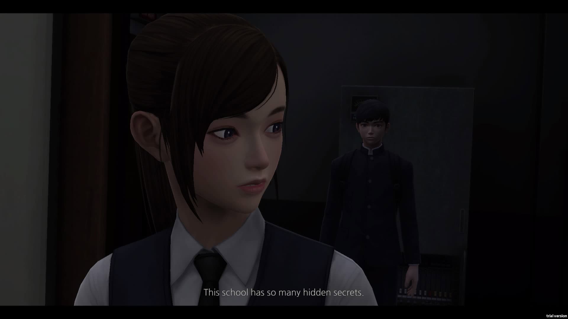 A girl wearing a school uniform stands in a doorway looking slightly over her shoulder to speak with a boy, also wearing a school uniform, standing behind her. The dialogue reads "This school has so many hidden secrets."